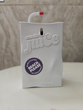 Juicy Couture White Bottle with Purple 'Beach Please' Label